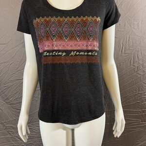 Elegant Black Tee with Vibrant Pattern